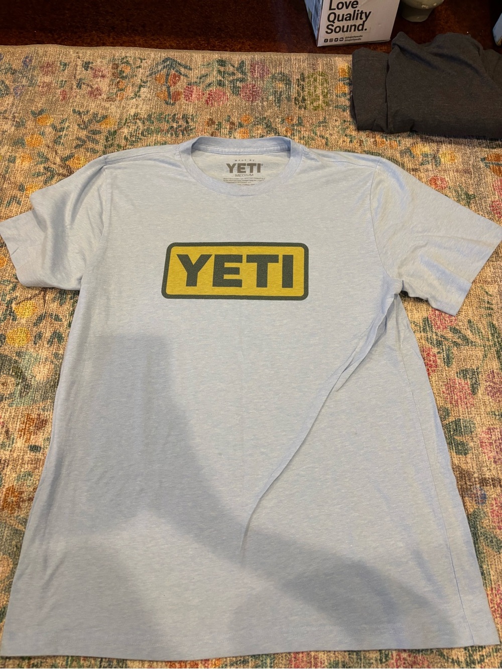 Yeti Light Blue Short Sleeve Tee with Yellow Logo